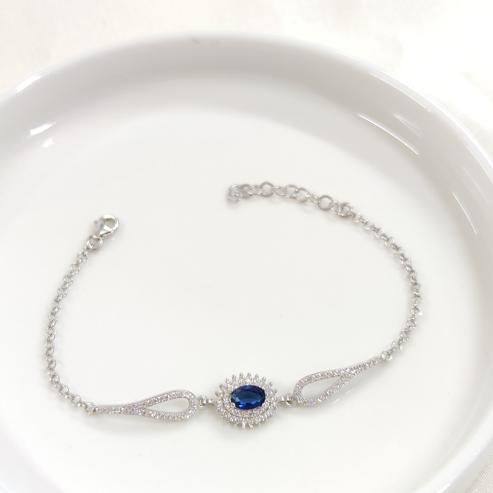 SAFİR ZİRKON TAŞLI OVAL GÜMÜŞ BİLEKLİK - RODYUM BEYAZ