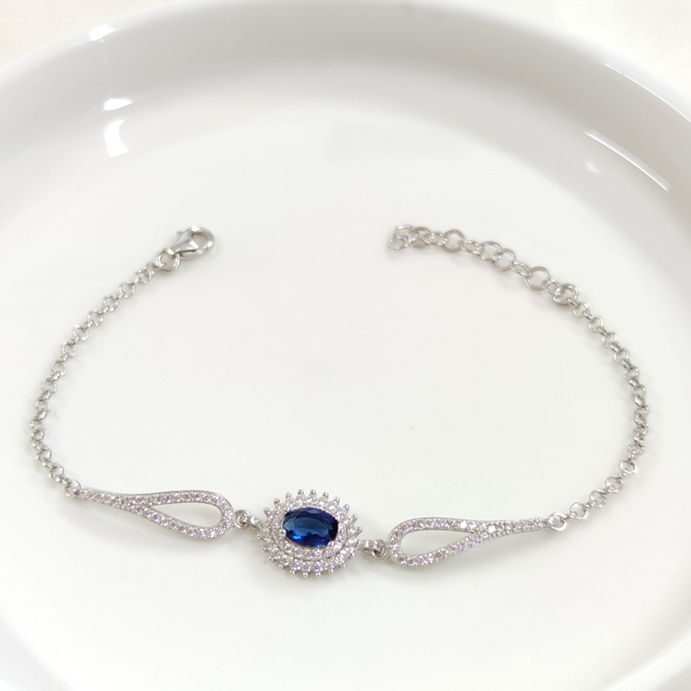 SAFİR ZİRKON TAŞLI OVAL GÜMÜŞ BİLEKLİK - RODYUM BEYAZ