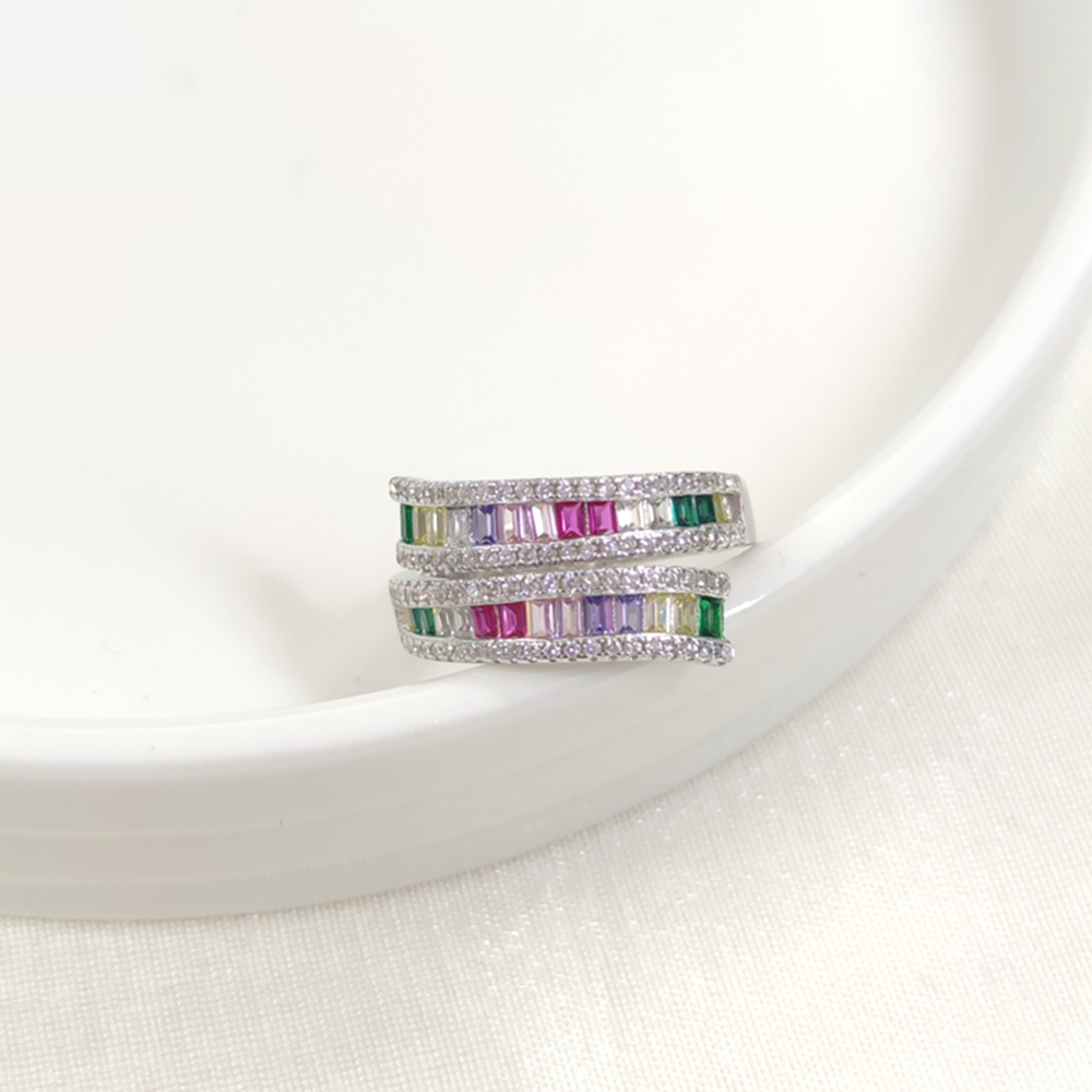 İTHAL RENKLİ SARMAL BAGET TAŞLI GÜMÜŞ YÜZÜK